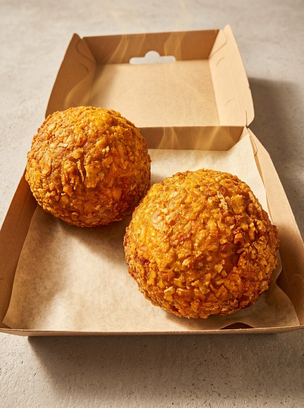 Two golden Dorito-crusted Dah's Bombs